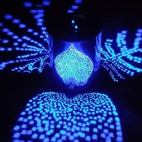 ასე უბრალოდ ნუღარ გადააგდებთ თუნუქის ქილას, ის ხომ მშვენივრად ასრულებს დეკორატიულ ფუნქციას შუქთან შეხამებით.